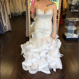 Brand new wedding dress. Never been worn.